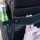 A pass-through loop lets you perch the Urbex on a suitcase without it falling off. (Image: Andrew Liszewski/Gizmodo)